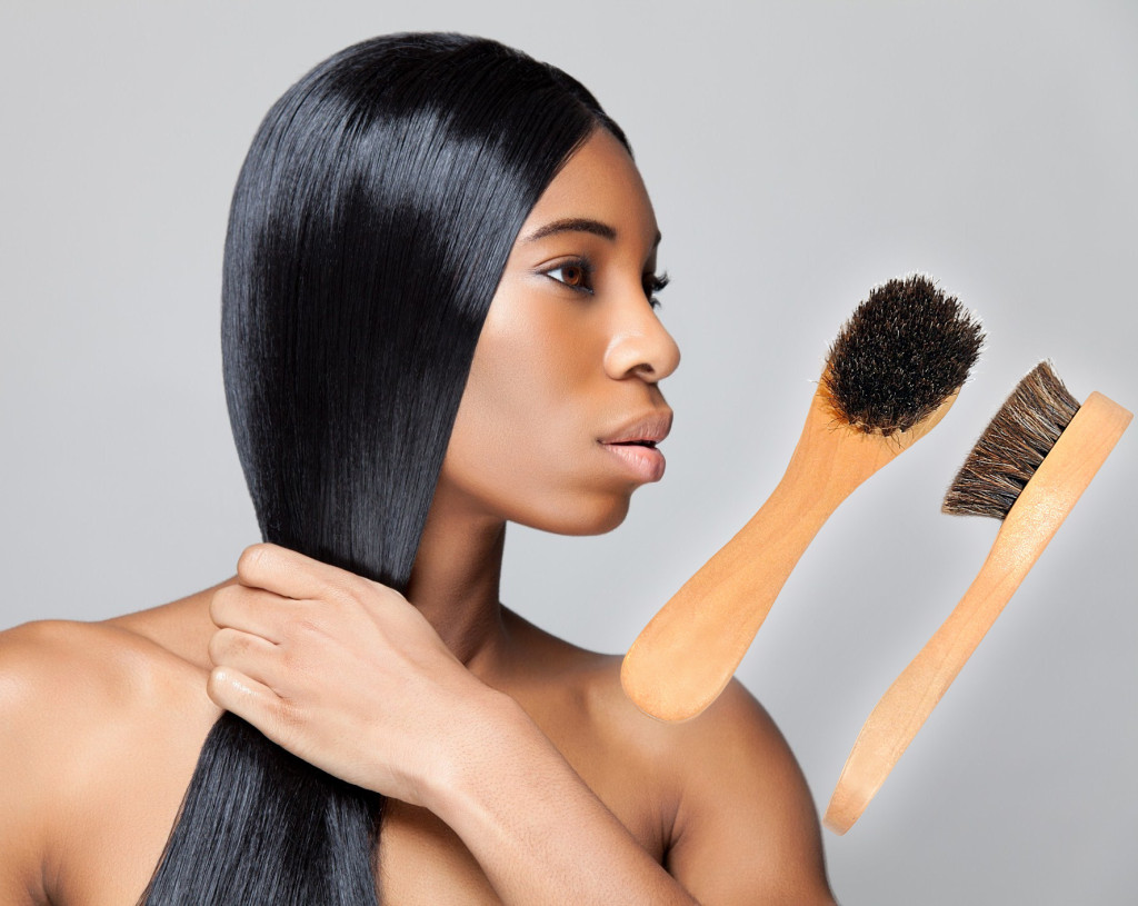 beautiful black woman with 2 Face Brushes