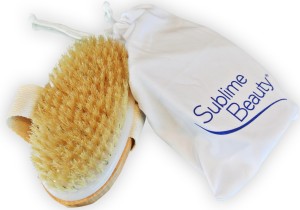 Travel brush and pouch on white